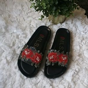 Melissa slip sandals beach black/red